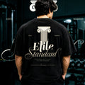 EL AURUM Essential Black Oversized Terry Tee — front view, drop-shoulder silhouette